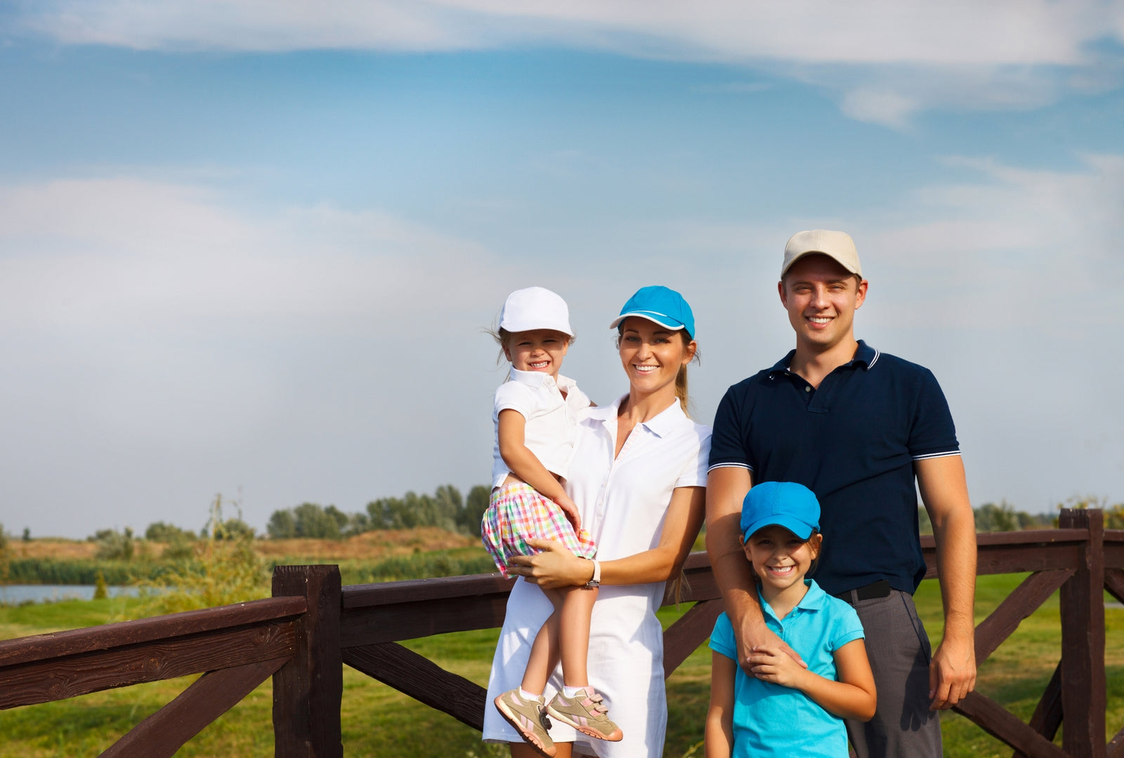 family wearing country club attire at a golf country club